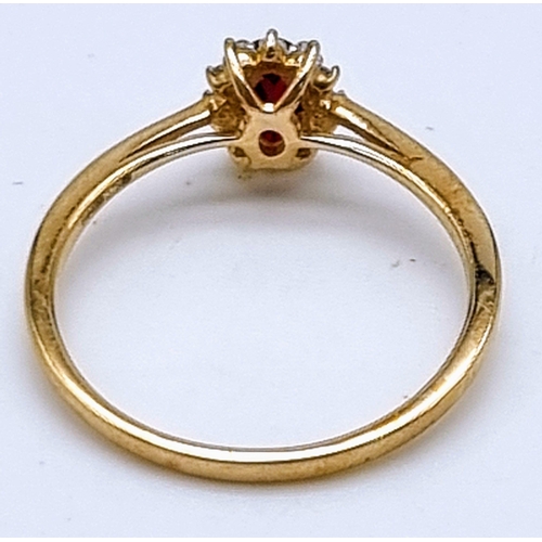 1111 - 9k yellow gold diamond and red stone cluster ring Size L 1.25g