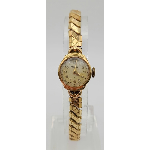 422 - A Vintage Rotary 9K Yellow Gold Cased Ladies Watch. Expandable strap. Mechanical movement. A/F.