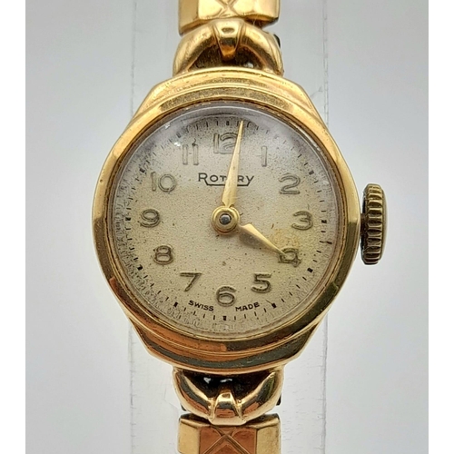 422 - A Vintage Rotary 9K Yellow Gold Cased Ladies Watch. Expandable strap. Mechanical movement. A/F.