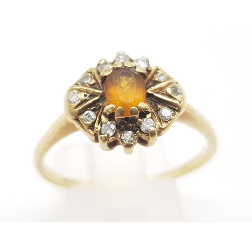 360 - 18k Yellow Gold Diamond and Citrine Cluster Ring.
Size T, weighs 2.7g