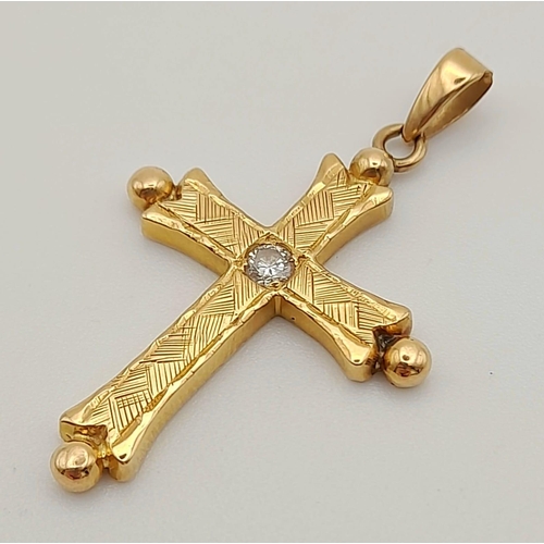 78 - 18k Yellow Gold Diamond Set Cross. 0.08ct Diamond. Weighs 5.7g