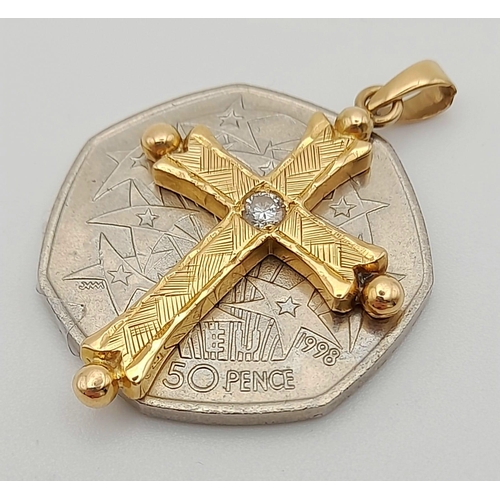78 - 18k Yellow Gold Diamond Set Cross. 0.08ct Diamond. Weighs 5.7g
