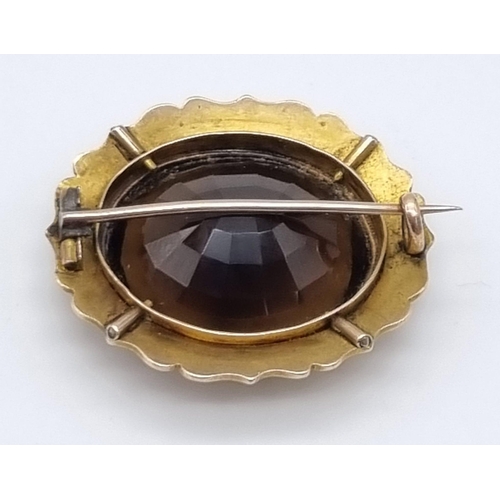 596 - A Victorian Era Large Oval Smoky Quartz Set in Gilded Silver Brooch. Over 40ct of quality faceted sm... 