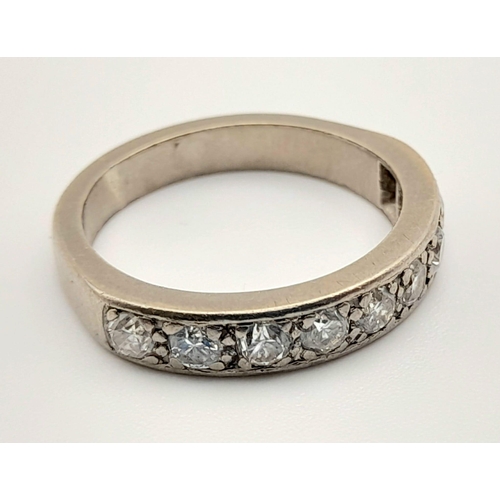 180 - An 18K White Gold Diamond Half Eternity Ring. 0.90ct 
Size K/L. Total weight: 4.60