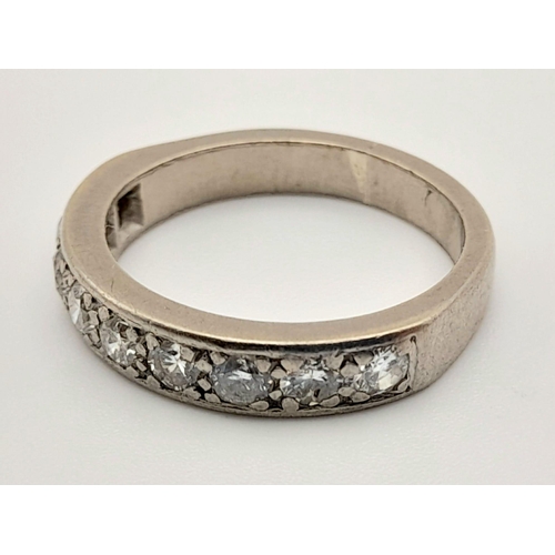 180 - An 18K White Gold Diamond Half Eternity Ring. 0.90ct 
Size K/L. Total weight: 4.60