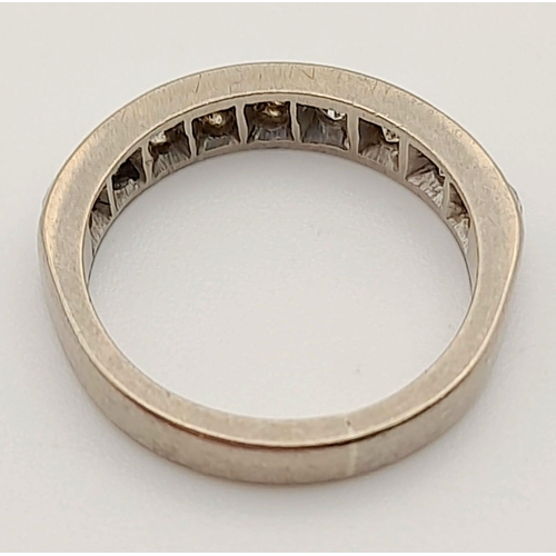 180 - An 18K White Gold Diamond Half Eternity Ring. 0.90ct 
Size K/L. Total weight: 4.60