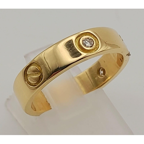 197 - 18k yellow gold Cartier style diamond 4mm wide band ring Size P, weighs 6.45g (0.15ct diamonds)