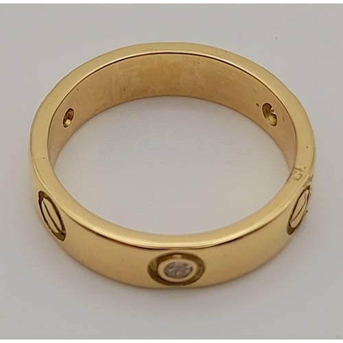 197 - 18k yellow gold Cartier style diamond 4mm wide band ring Size P, weighs 6.45g (0.15ct diamonds)