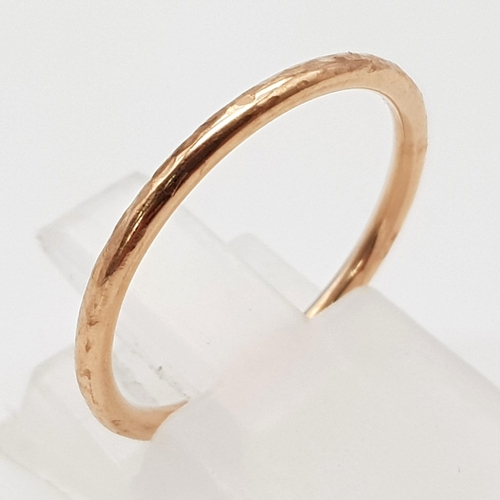 1097 - 9k rose gold hammered band ring 
Size N, weighs  1.27g