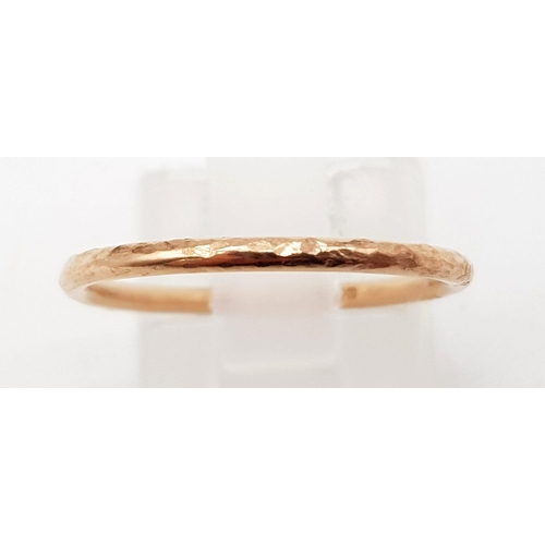 1097 - 9k rose gold hammered band ring 
Size N, weighs  1.27g