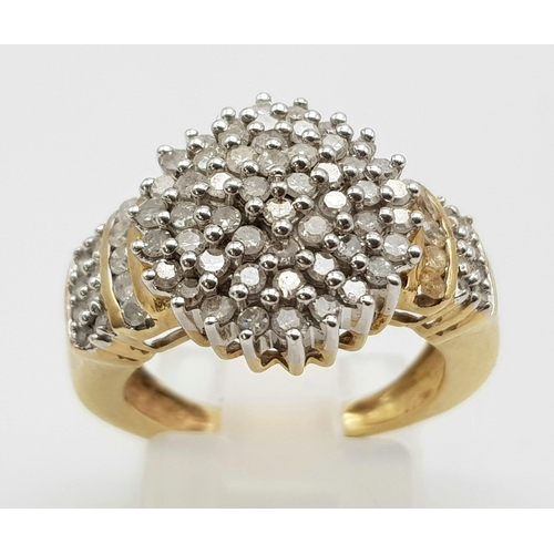 173 - An 9K Yellow Gold Diamond Cluster Ring. With 3 Rows Diamond on Shoulder. 1CT
Size L. Total Weight: 5... 