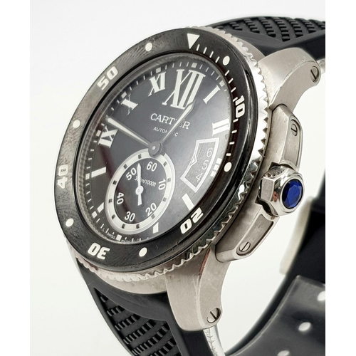 37 - A Cartier Divers Gents Watch. Calibre de Cartier. Good to 300M. Black rubber strap. Stainless steel ... 