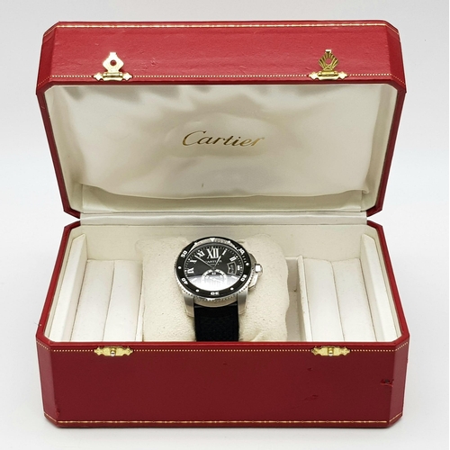 37 - A Cartier Divers Gents Watch. Calibre de Cartier. Good to 300M. Black rubber strap. Stainless steel ... 