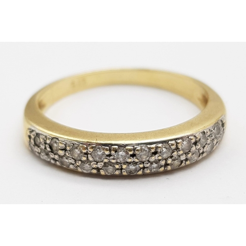 501 - 14k Yellow Gold Diamond Band Ring.
2.45g, size M.