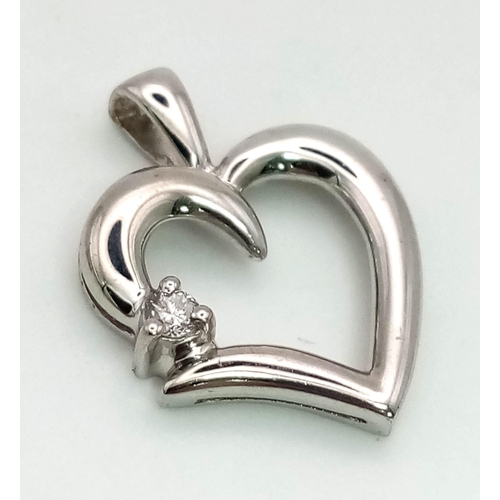 1212 - 9K White Gold DIAMOND SET OPEN HEART PENDANT, weighs 1.5G