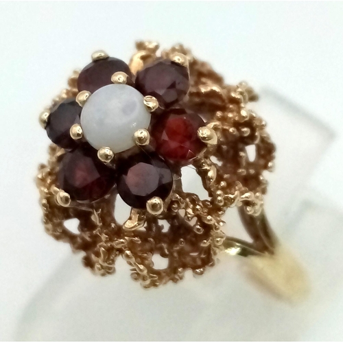 284 - 9k Yellow Gold Garnet And Opal Cluster Ring. 
Size K, Weighs 4.1G