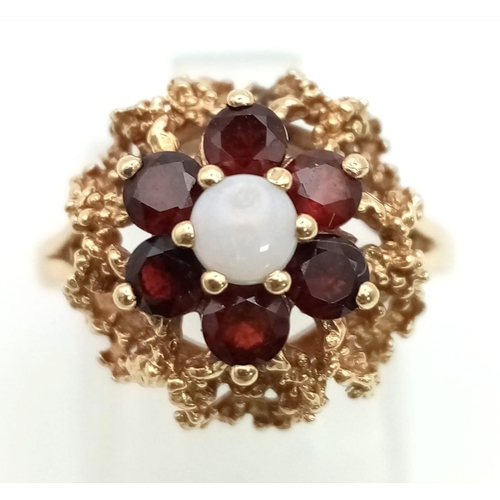 284 - 9k Yellow Gold Garnet And Opal Cluster Ring. 
Size K, Weighs 4.1G