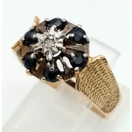 423 - 9k yellow gold diamond and sapphire cluster ring 
Size L, weighs 3.5g (0.02ct diamonds/0.30ct sapphi... 