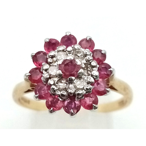 458 - 9k Yellow Gold Diamond and Ruby Cluster Ring.
Size S, weighs 3.5g