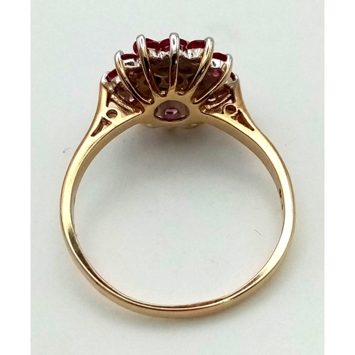 458 - 9k Yellow Gold Diamond and Ruby Cluster Ring.
Size S, weighs 3.5g