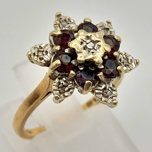 494 - 9k Yellow Gold Diamond and Garnet Cluster Ring.
Size K, weighs 3.61g