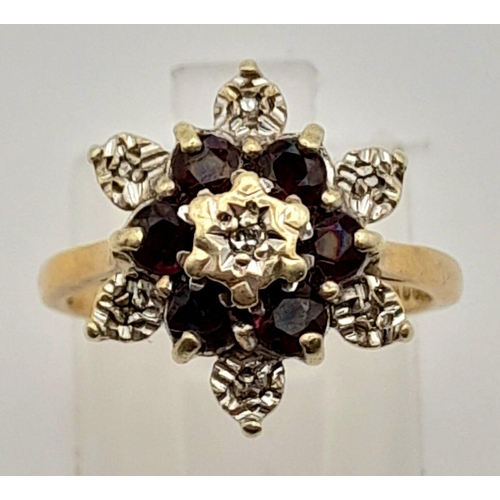 494 - 9k Yellow Gold Diamond and Garnet Cluster Ring.
Size K, weighs 3.61g