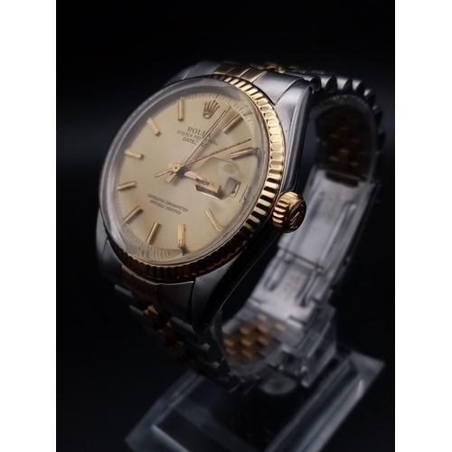 199 - A Rolex Oyster Perpetual Datejust Gents Watch. Bi-metal strap and case - 36mm. Gold dial. Automatic ... 