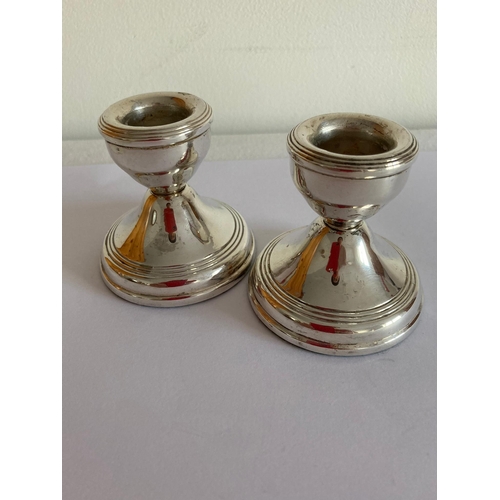 216 - Pair of vintage dwarf SILVER CANDLESTICKS. Having clear Hallmark for W.I Broadway and Co,Birmingham ... 