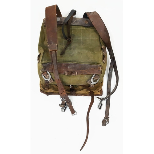 266 - WW2 German 1939 Dated Tornister/Haversack. Canvas and leather construction, with horse fur covered f... 