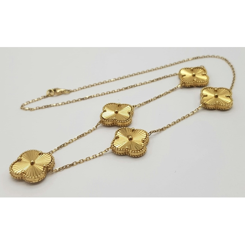 65 - An 18K Yellow Gold Clover Necklace in a Van Cleef & Arpels STYLE. 16g , 44.5cm length.
