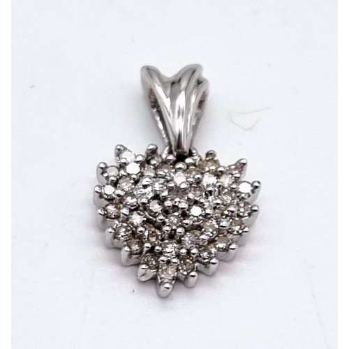 1207 - 9K White Gold DIAMOND SET HEART PENDANT, 0.20CT Diamond, weighs  1.9G