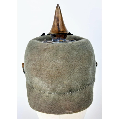34 - WW1 Imperial German Army Prussian M15 Pickelhaube Uniform Helmet. A felt constructed example with ni... 