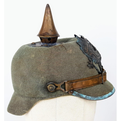 34 - WW1 Imperial German Army Prussian M15 Pickelhaube Uniform Helmet. A felt constructed example with ni... 