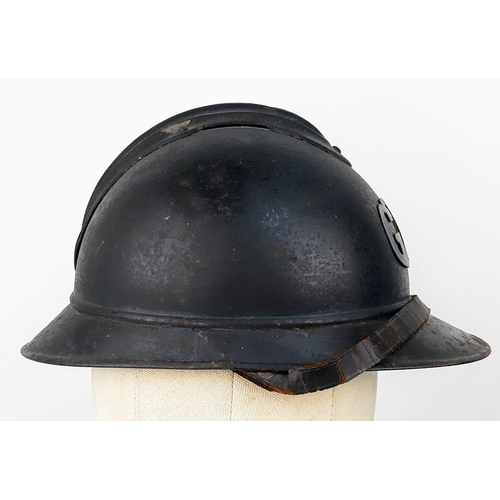 341 - WW1 French M15 Adrian Helmet with Applied Gas Troop Badge. The helmet of usual form split pin ‘comb’... 