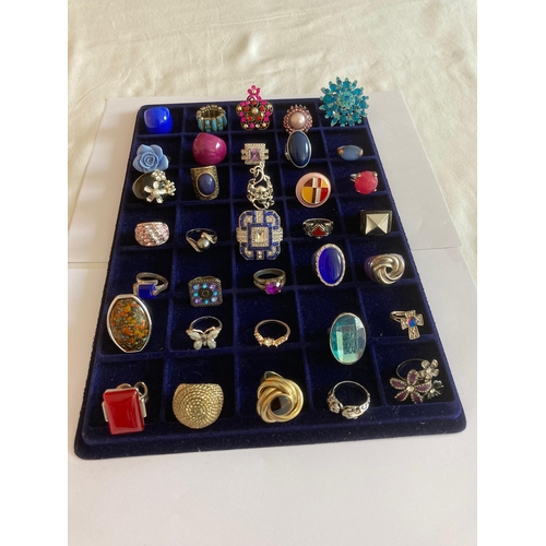 546 - Large selection of of DRESS RINGS  to include gold tone,Silver tone, and many jewelled statement pie... 