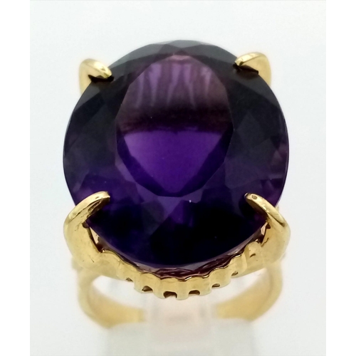 205 - An 18k Yellow Gold and Siberian 35ct Plus, Amethyst Ring. 14.5g total weight. Size N.