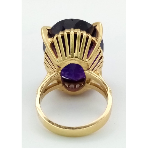 205 - An 18k Yellow Gold and Siberian 35ct Plus, Amethyst Ring. 14.5g total weight. Size N.