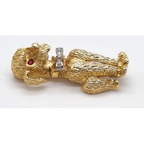 219 - 14k Yellow Gold Designer Poodle, with Diamond Bow, Ruby Eyes and makers mark. weighs 13.72G