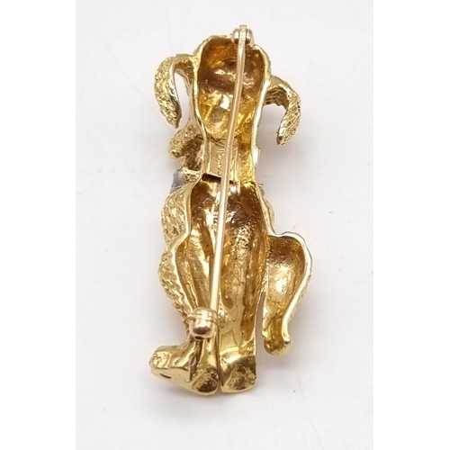 219 - 14k Yellow Gold Designer Poodle, with Diamond Bow, Ruby Eyes and makers mark. weighs 13.72G