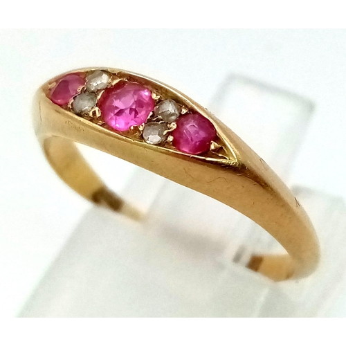 233 - An 18K Victorian Yellow Gold Diamond and Ruby ring.
Size L. 2.36g total weight.