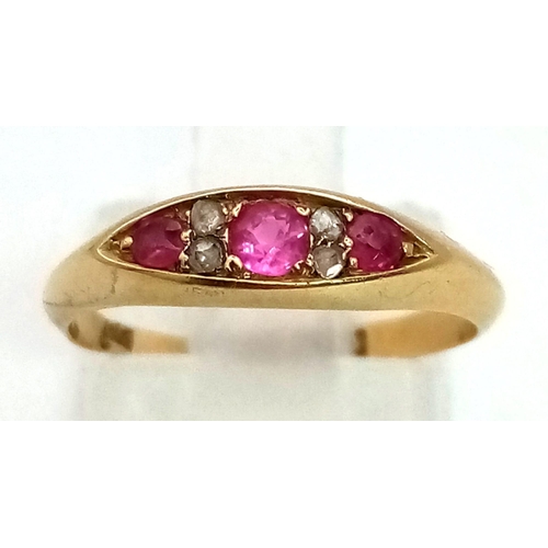 233 - An 18K Victorian Yellow Gold Diamond and Ruby ring.
Size L. 2.36g total weight.