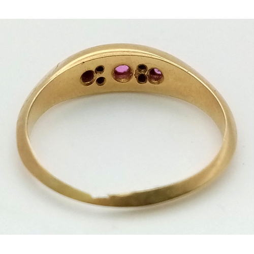 233 - An 18K Victorian Yellow Gold Diamond and Ruby ring.
Size L. 2.36g total weight.