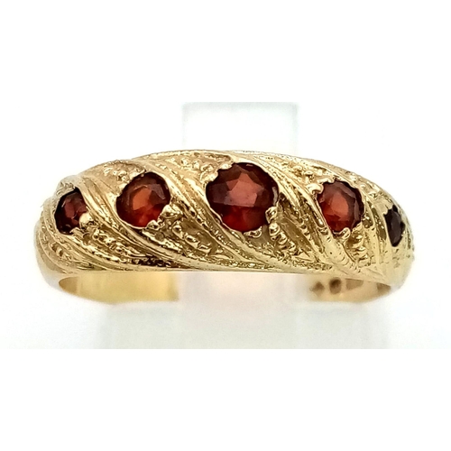 368 - A Vintage 9K Yellow Gold Five Garnet Ring. 2.1G total weight. Size L.