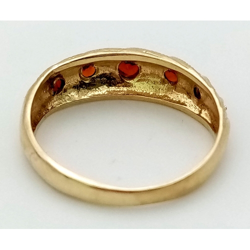 368 - A Vintage 9K Yellow Gold Five Garnet Ring. 2.1G total weight. Size L.