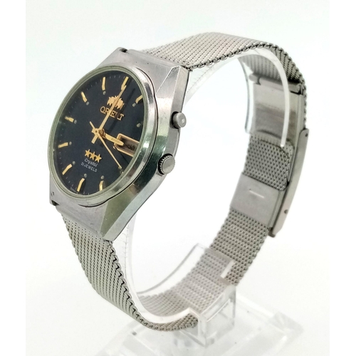 1214 - A Vintage Orient 21 Jewel Automatic Gents Watch. Stainless steel strap and case - 36mm. Black dial w... 