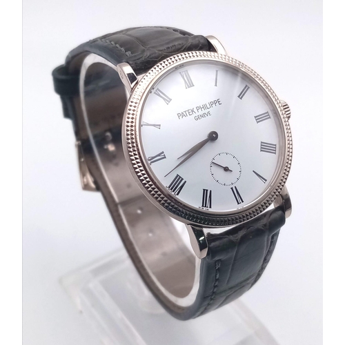 260 - A Patek Phillipe Calatrava 18K White Gold Gents Watch. Leather strap. Gold case - 31mm. Mechanical m... 