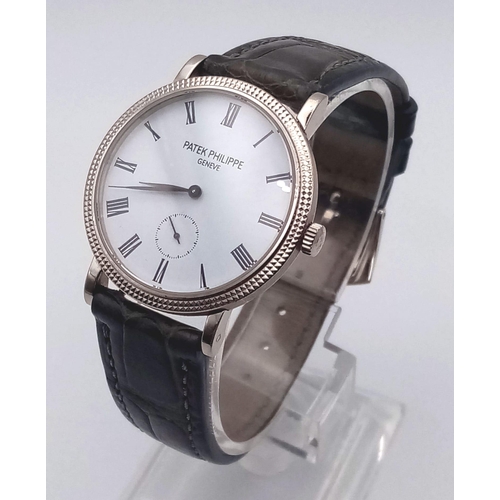 260 - A Patek Phillipe Calatrava 18K White Gold Gents Watch. Leather strap. Gold case - 31mm. Mechanical m... 