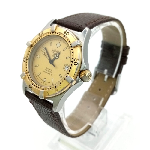 283 - A Tag Heuer 2000 Professional Unisex Divers Watch. Brown leather strap. Two-tone stainless steel cas... 