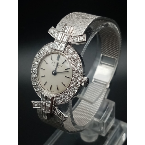 332 - A Chopard 18K White Gold and Diamond Ladies Watch. White gold strap and case - 25mm diameter. Diamon... 