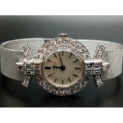 332 - A Chopard 18K White Gold and Diamond Ladies Watch. White gold strap and case - 25mm diameter. Diamon... 